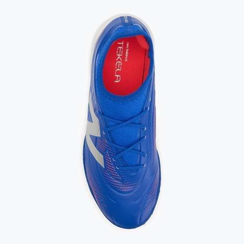 Ghete de fotbal pentru copii New Balance Tekela Team Low JR TF albastru